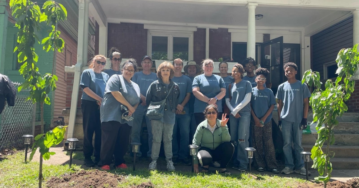 Serve Day helping with yard work for a refugee family