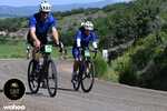 Cinthia (PS Student)  & Eddie Durrell (Donor & Volunteer) riding the 2025 SBT GRVL Race side by side 
