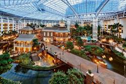 A large indoor mall with Gaylord Opryland Resort & Convention Center and trees

AI-generated content may be incorrect.