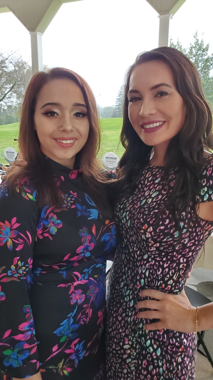 Destiny & Alisha at a golf outing where Destiny spoke about her BBBS experience