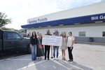 The RRCF Grant Task Force awards a $4,500 check to Turning Points