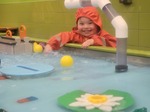 Ashton at Children's museum with DSAW-CV