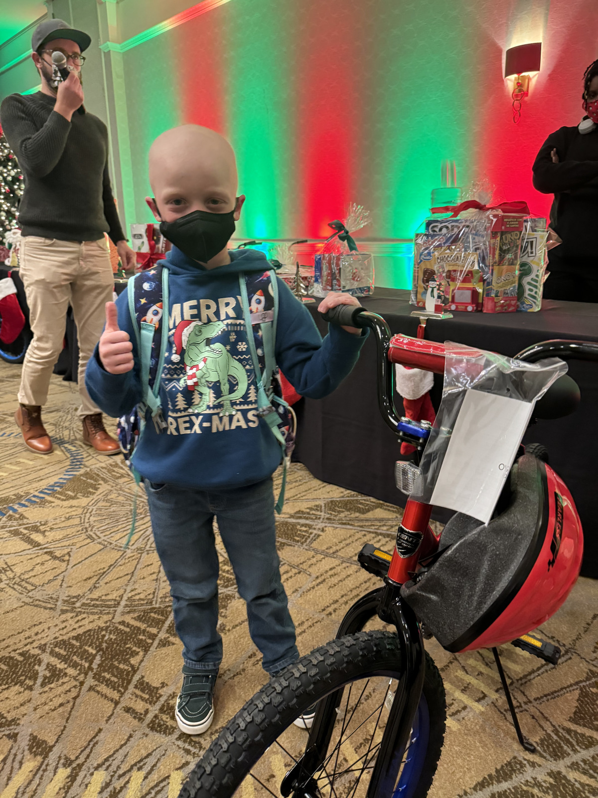 Winning a bike at the ASK Holiday Party