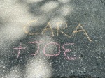 Sidewalk chalk with names of supporters