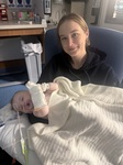 First time being held by mom post surgery.