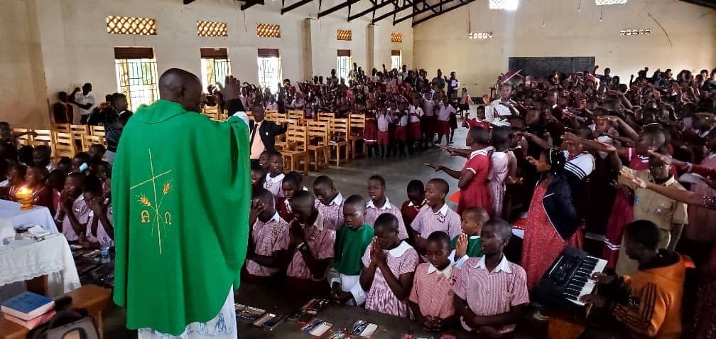 Father Simon Peter with SJA Students