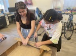 Middle school students work on an art project