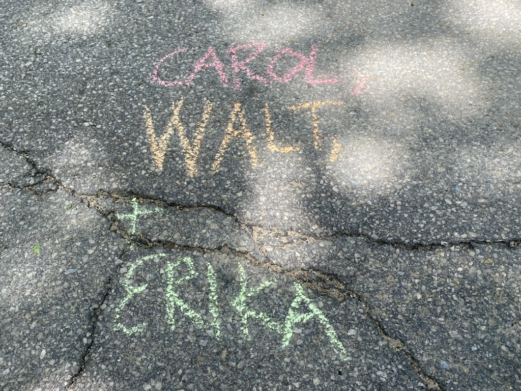 Sidewalk chalk with names of supporters