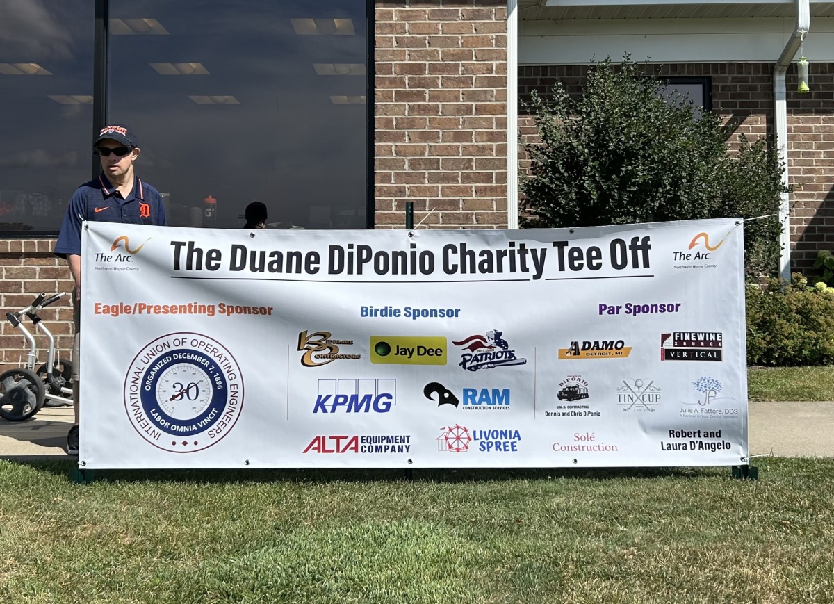 Duane and Sponsor Banner