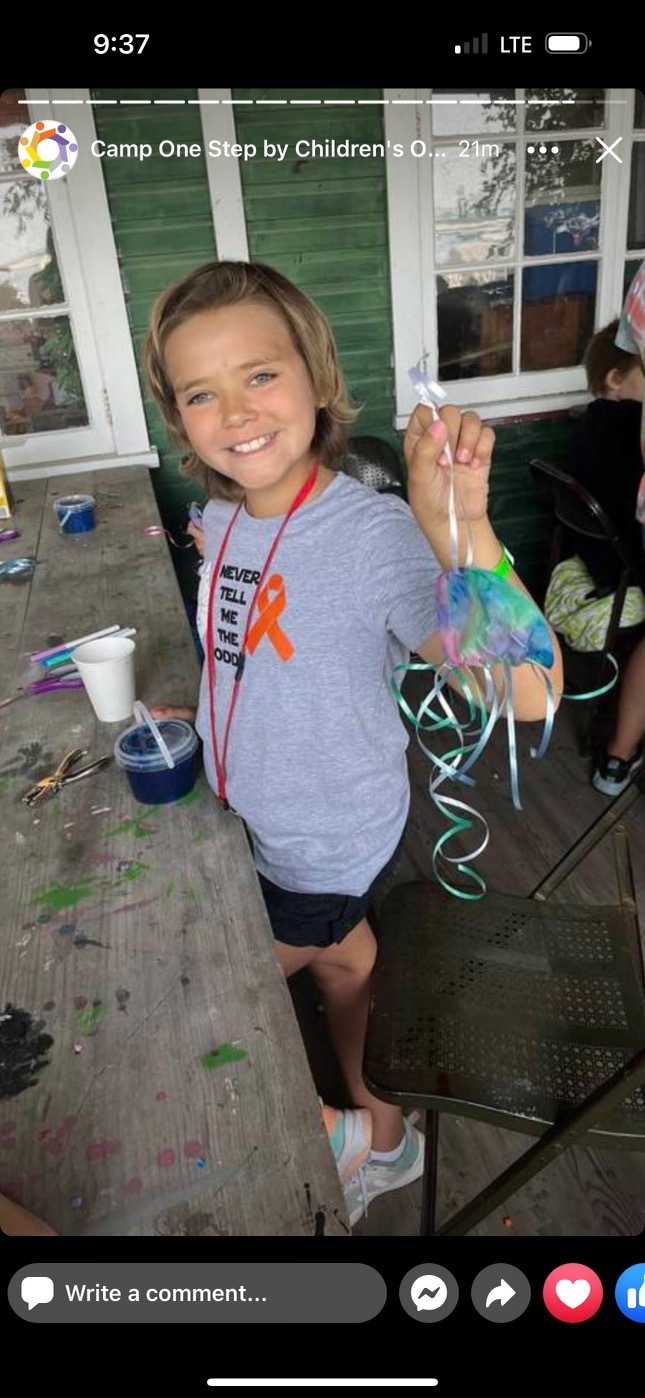 Hallie at camp doing crafts!