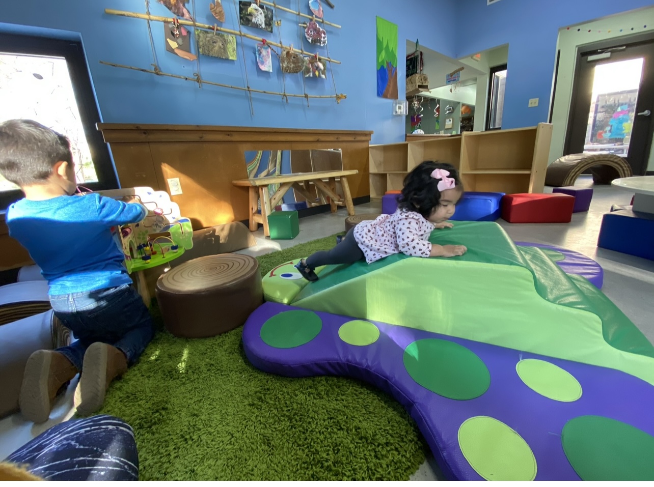 Learning to crawl and climb in the kids area