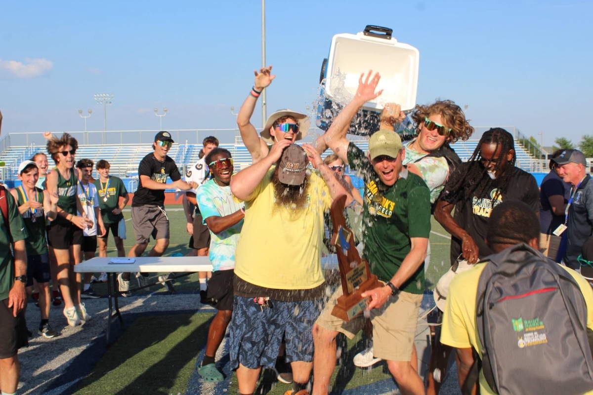The boys' track and field team celebrating their first championship in school history!