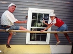 Dad and I painting the farm house.