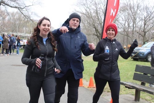 Me, my dad Jim, and my aunt Jane during QCP's Footsteps for Progress 5K in 2024