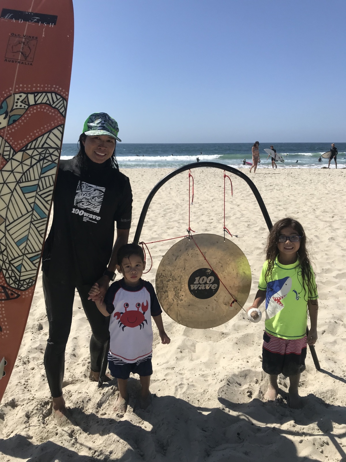 Rylan banged on the gong when mama finished 100 waves in 2019