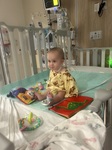Happy to be watching her cartoons sitting up!