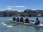 Volunteer coach, Bob Mills, steers this Veterans crew home to DBMS