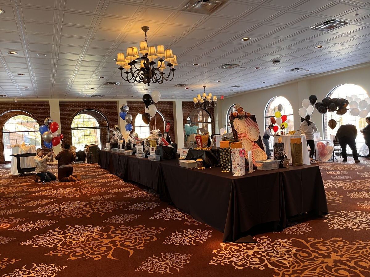 Committee setting up the raffle and cocktail reception room