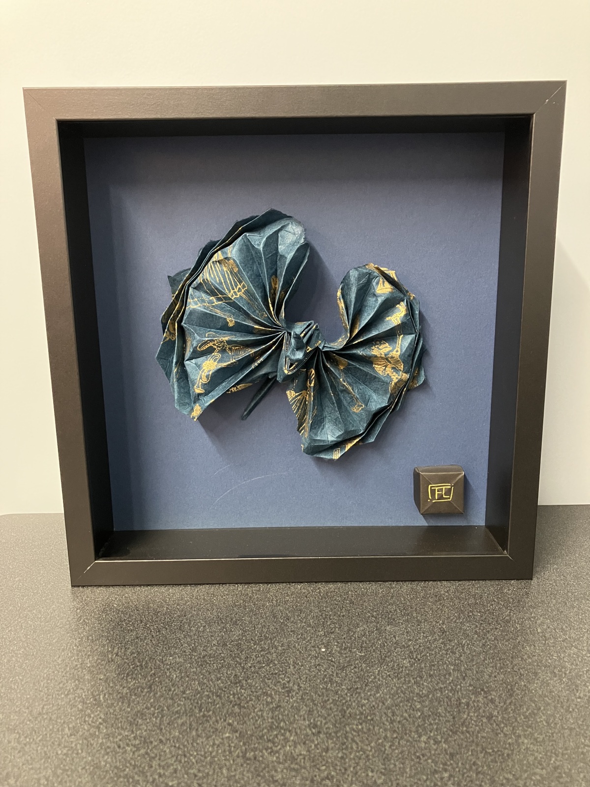 Framed origami crane by Freddy Lagunes González 