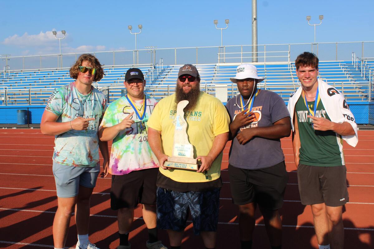 Coach Yarrington along with the 2023 Boys' Throwers