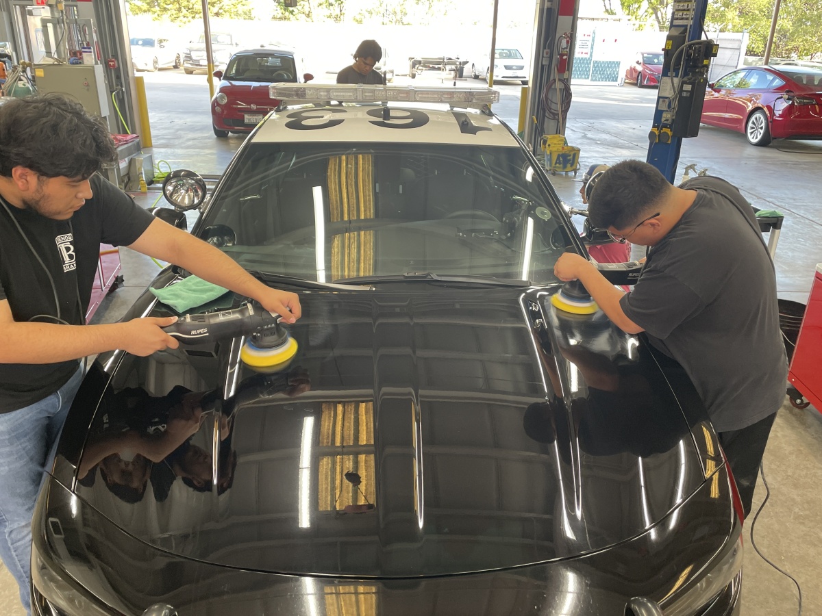 BC Students detailing vehicle