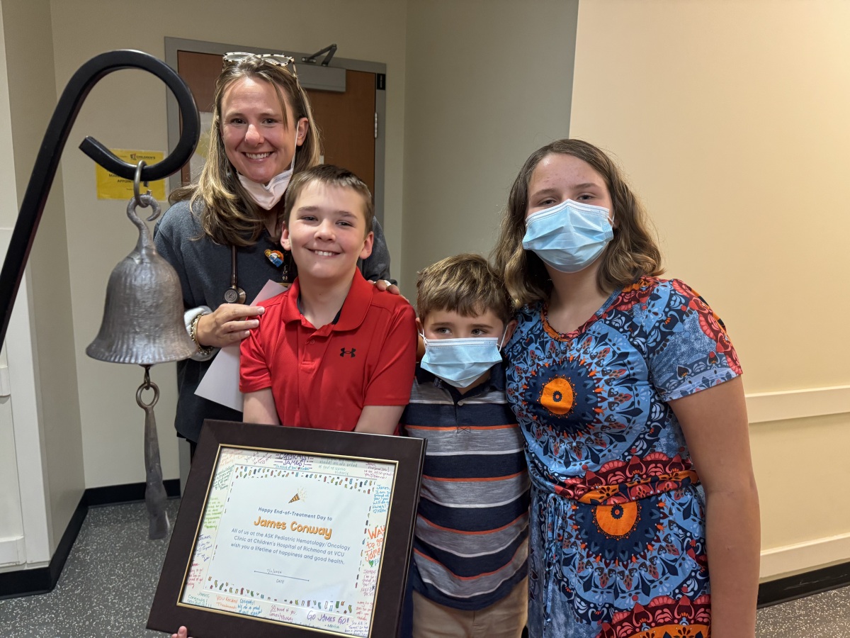 James was so happy to ring the bell!  Look at that smile!