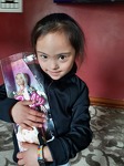 Kalaya with her DS Barbie