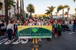Girl Scouts of Orange County spread holiday cheer during parade.
