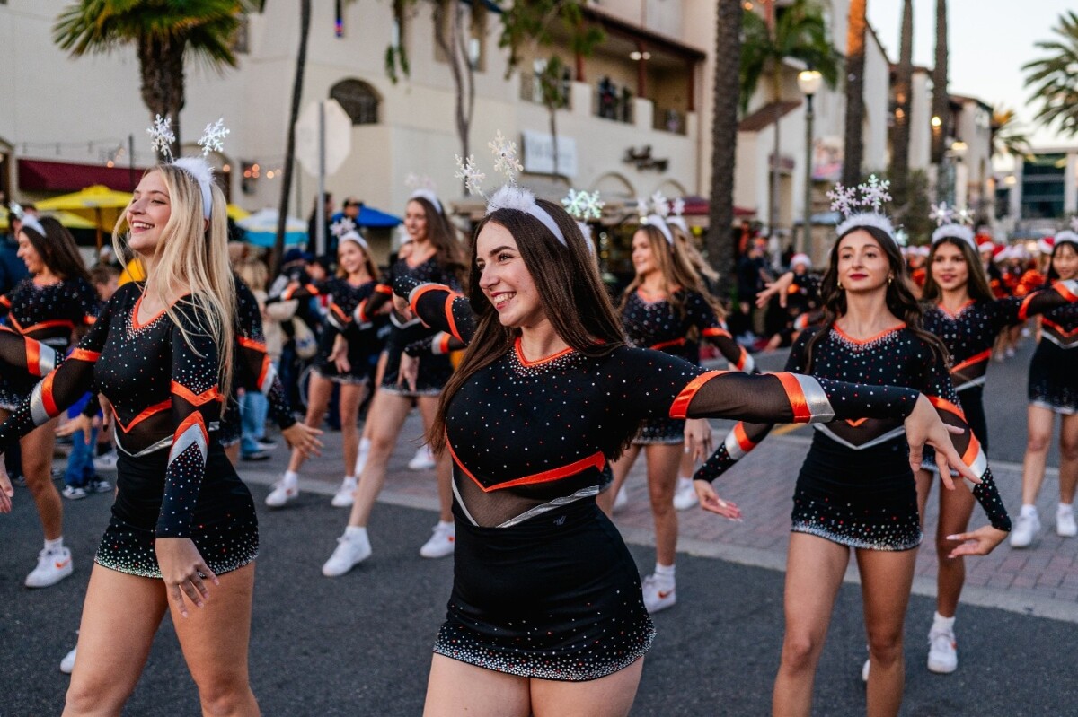Huntington Beach High School Dance Team perform during parade.