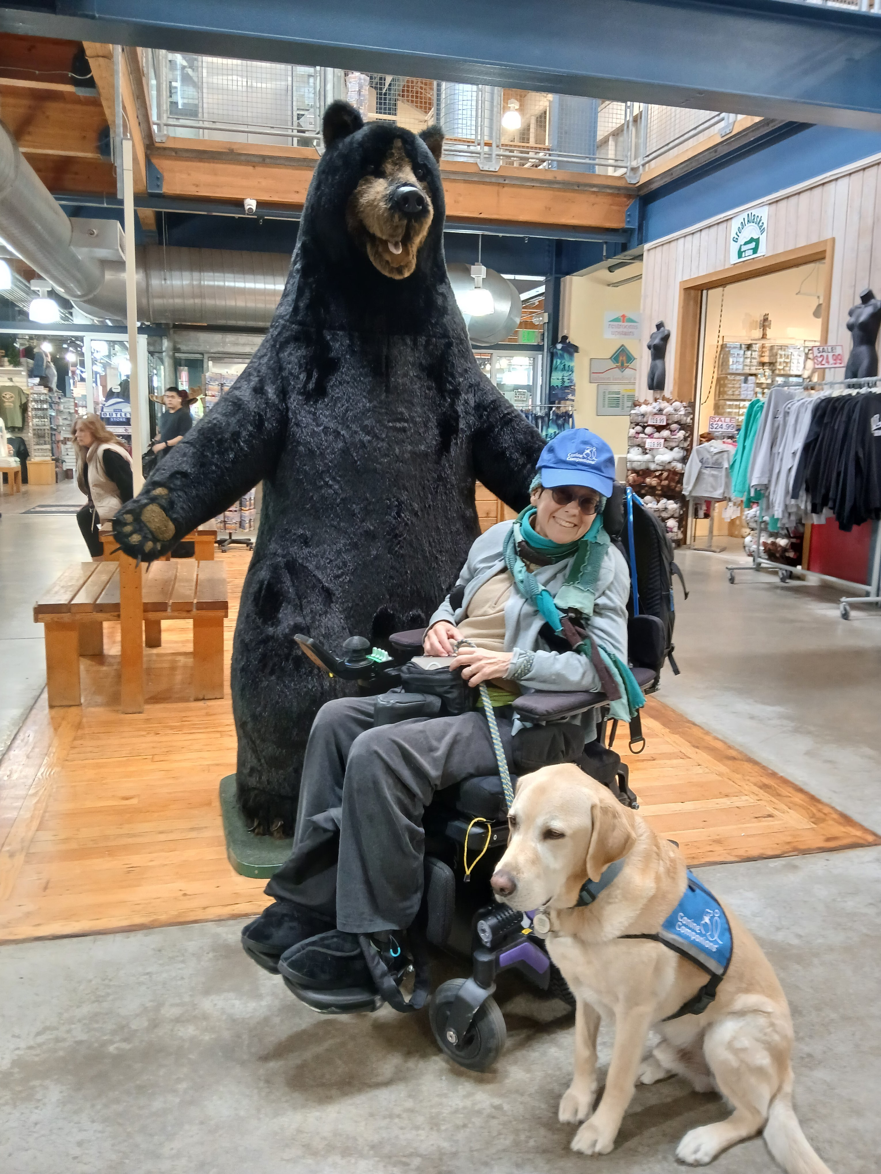 Larry Wallman & Shakti Bell with Service Dog Ember