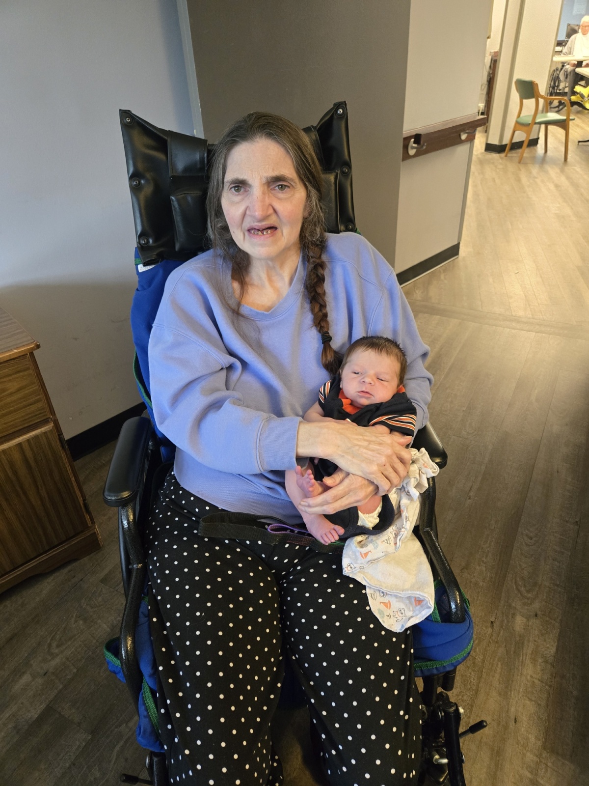 Sept 2024 - Mom and her grandson, Sean at 16 days old. *Fun fact: Sean was 16 days early and this photo was taken on the date he was due 9/29/2024