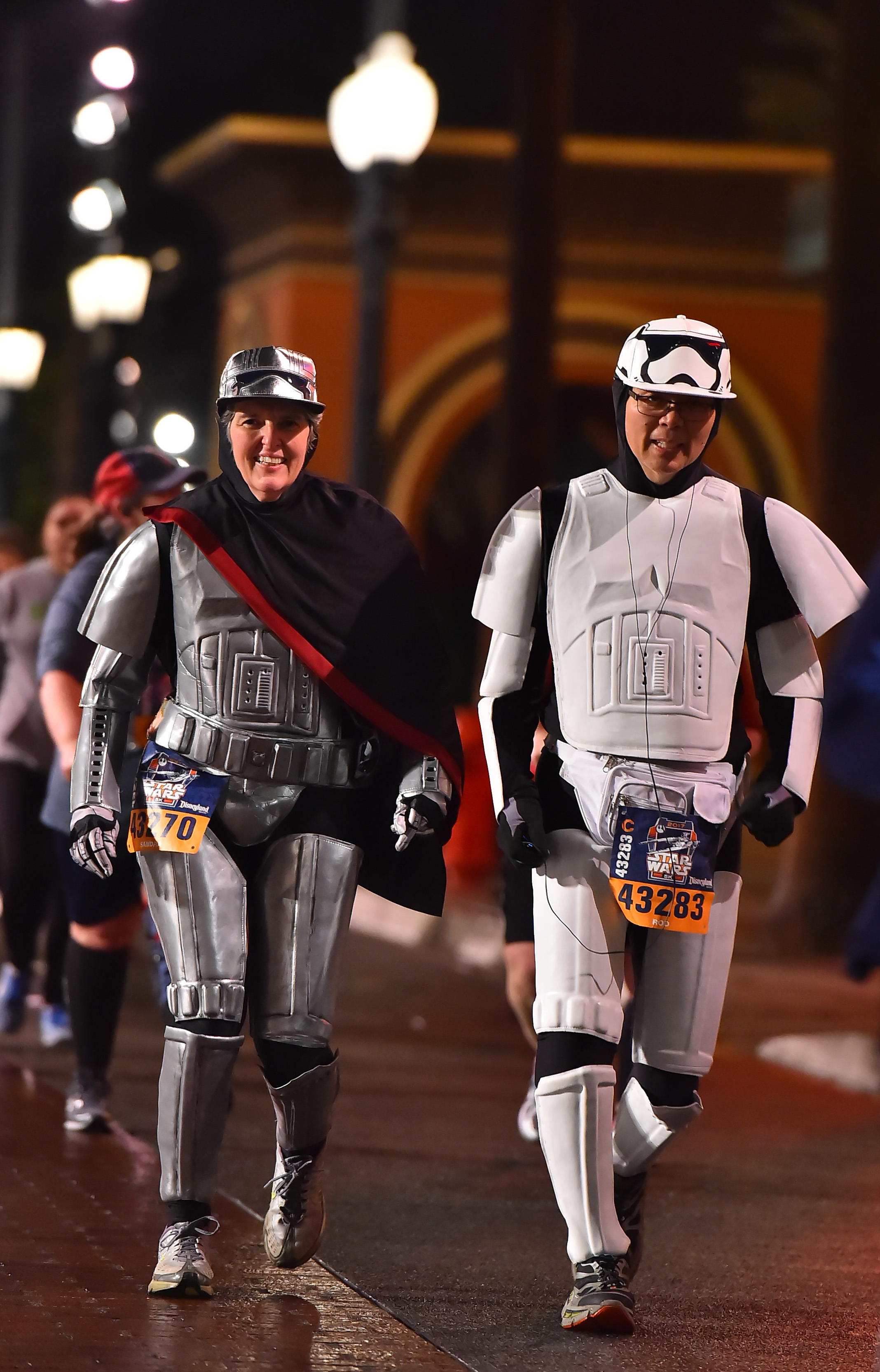 Sandy running at Disneyland as Captain Phasma with Storm Trooper