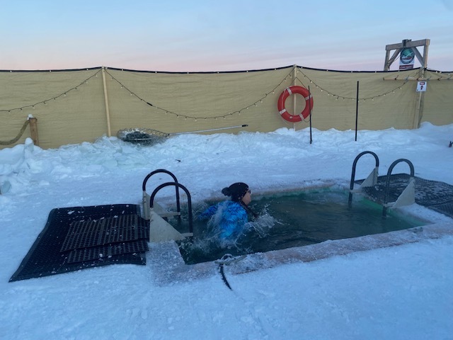Jennifer makes an entrance during the 2024 Can Geo Polar Plunge in Great Slave Lake, Northwest Territories.