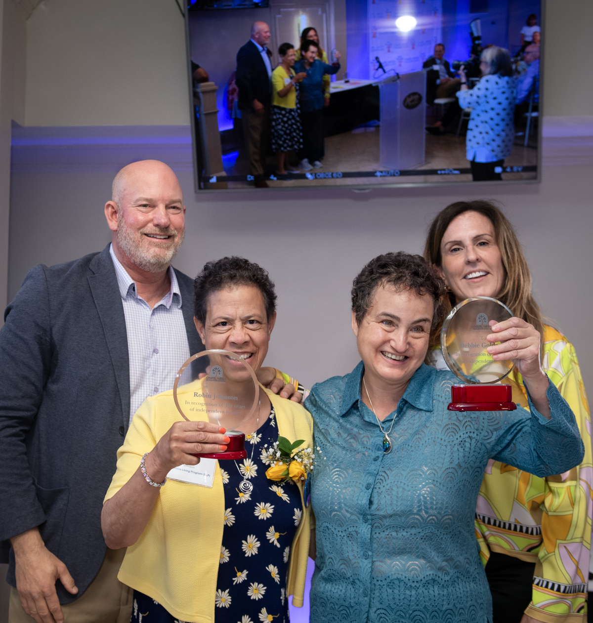 Award recipients Robin and Debbie with Mike and Sunny