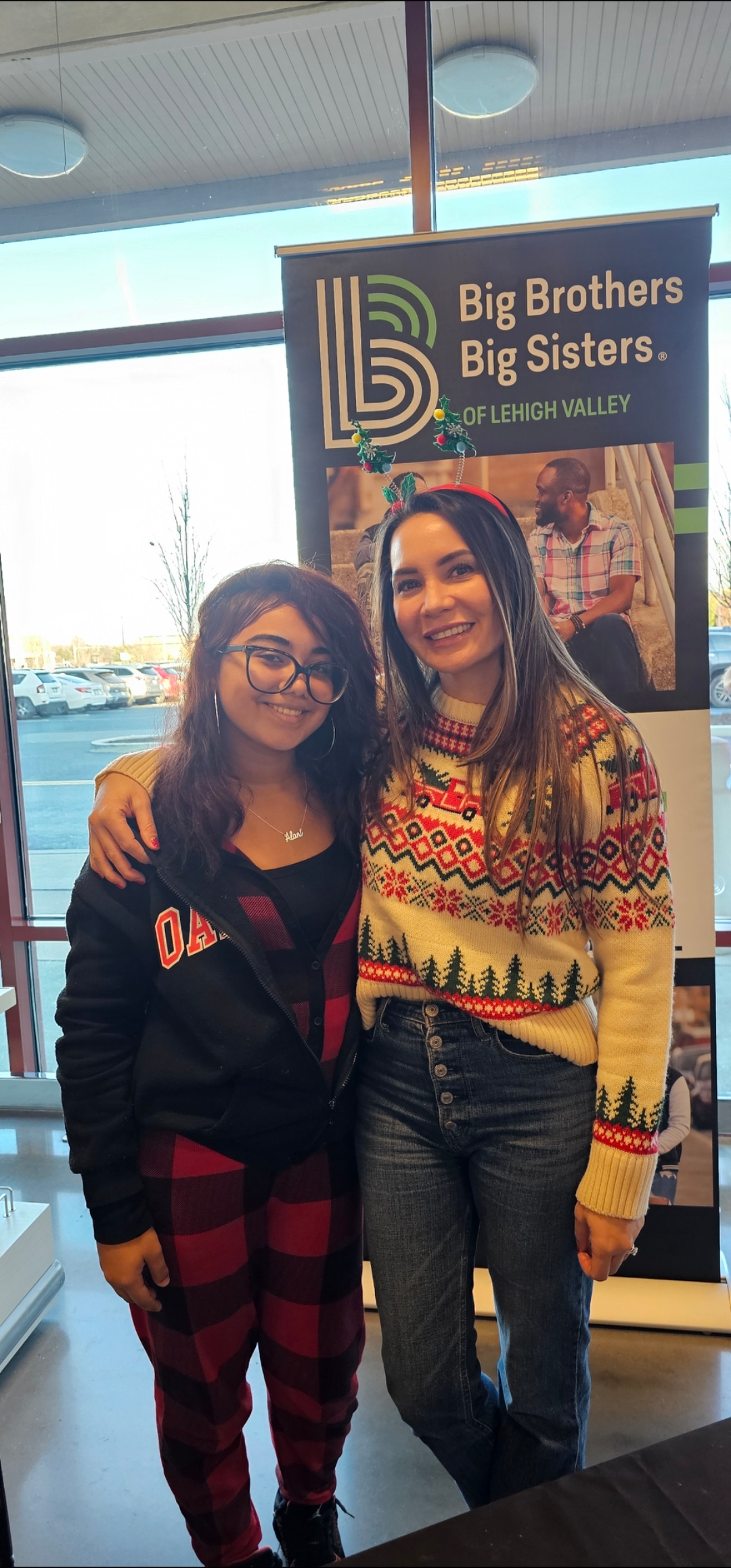 Alani & Alisha manning a table at Nordstrom Rack