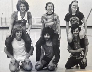 Thomas in college with friend Dave and Vic. The team came in second during a volleyball tournament.