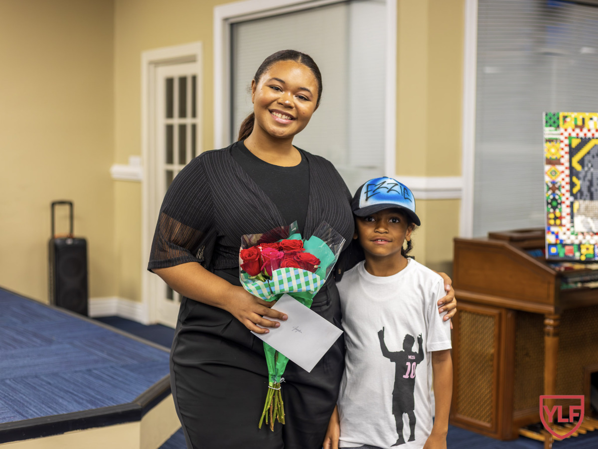 YLF Boys Present Roses to their Mothers